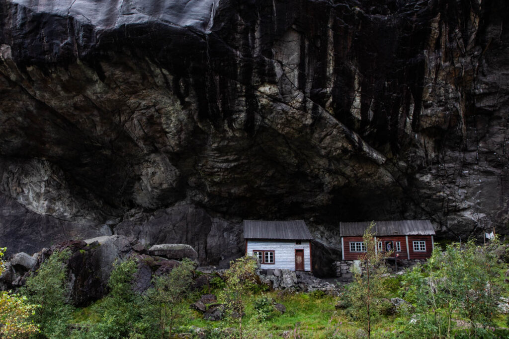 Two old houses from the 1800's, protected by Helleren rock.